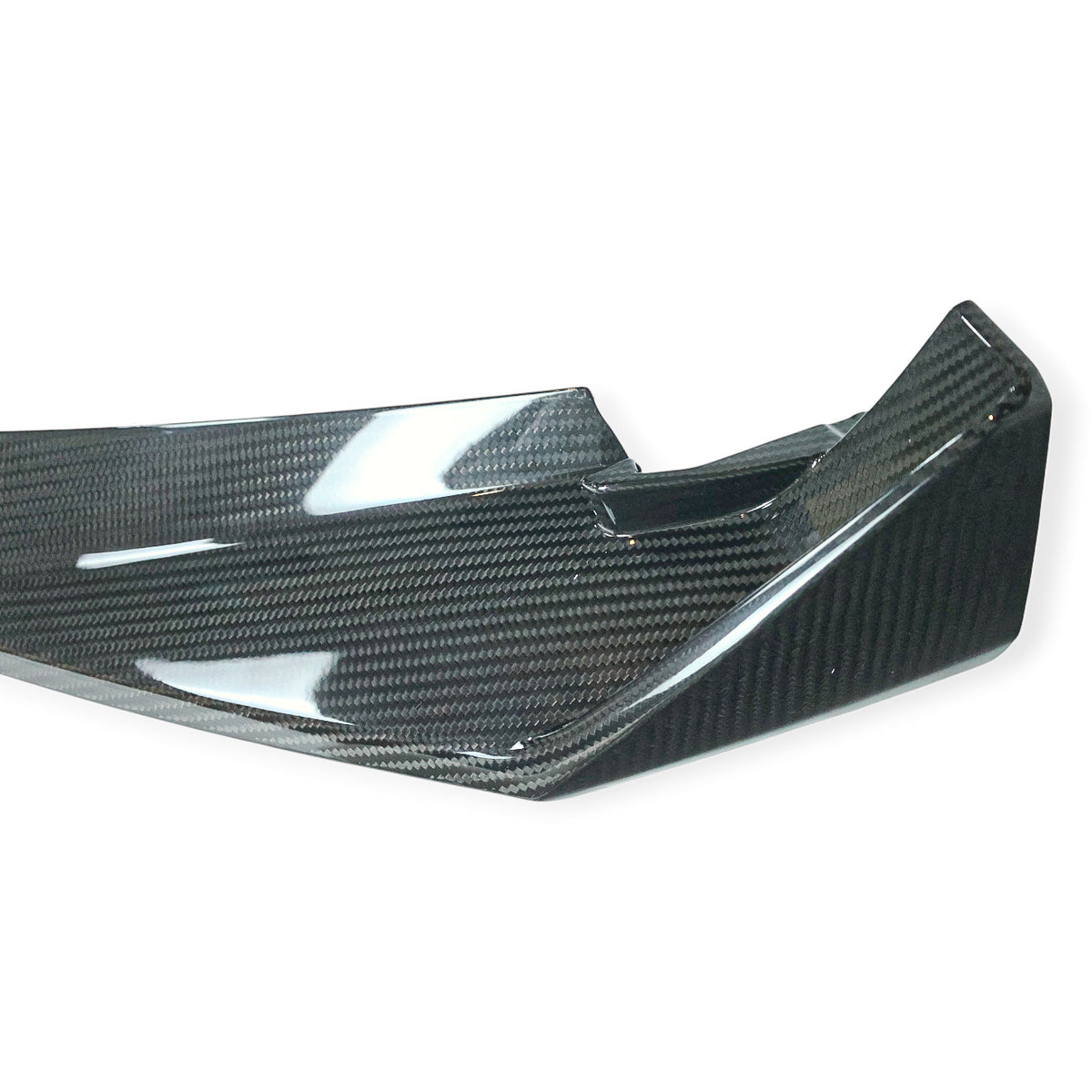 Carbon Corp. MP style carbon fiber front splitter for BMW M3 G80 and M4 G82 with a glossy weave finish