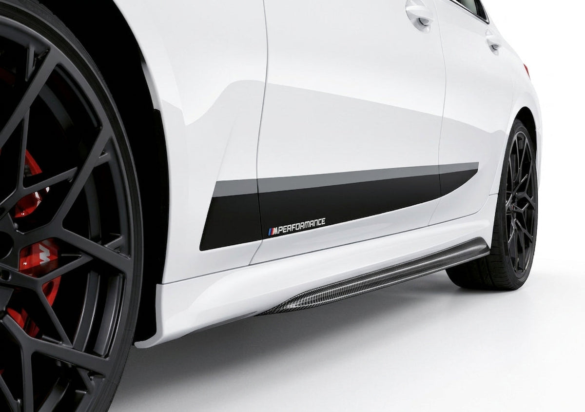 Carbon Corp. carbon fibre side skirt installed on a white BMW 3-Series G20 with M Performance decal