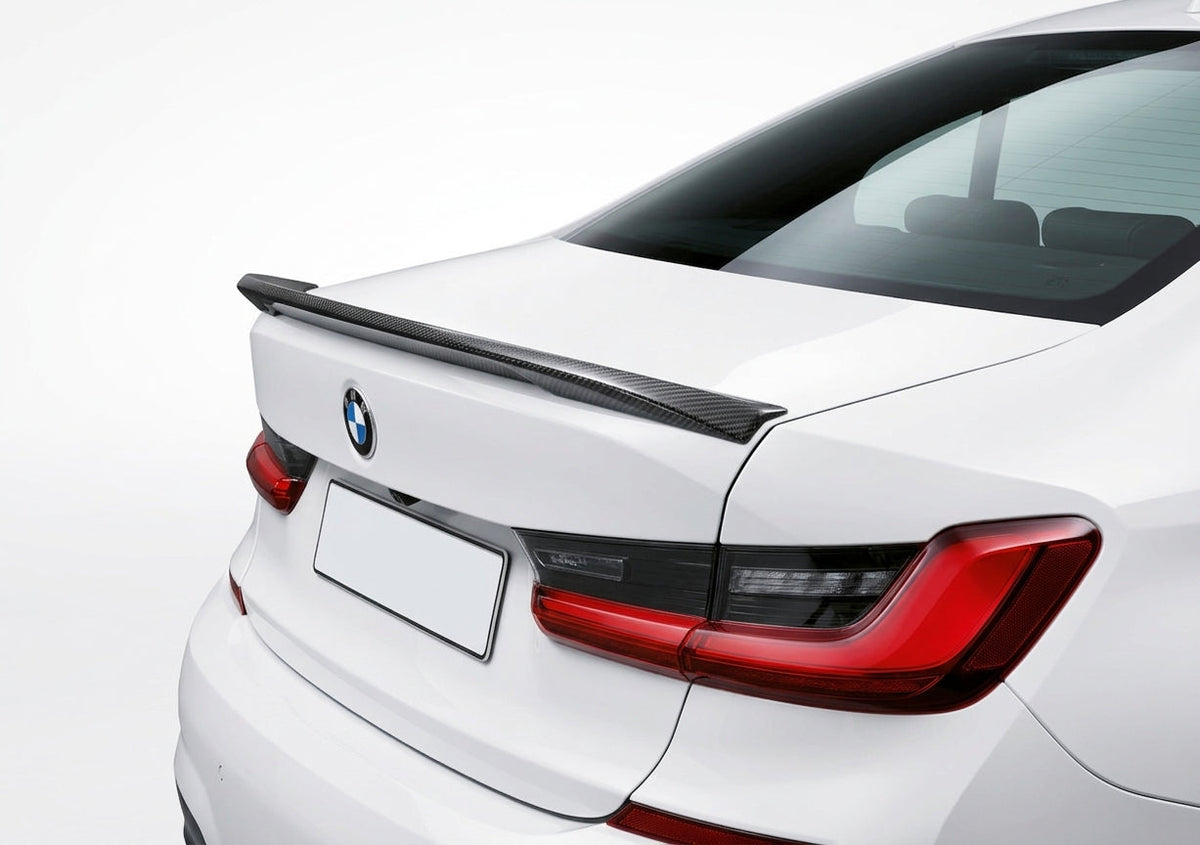 Carbon Corp. M Performance style carbon fibre rear boot spoiler fitted on a white BMW G20 3-Series saloon