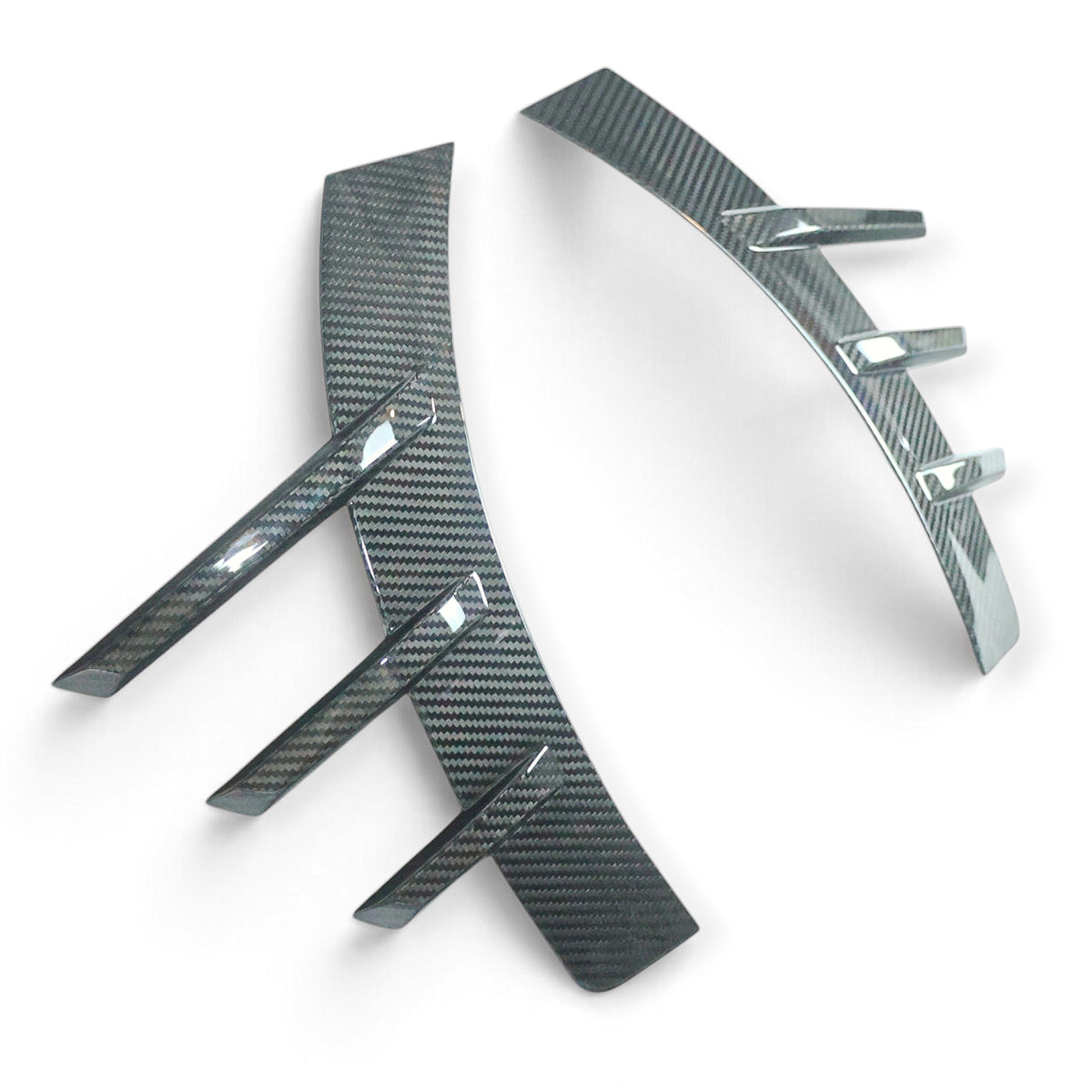 Carbon Corp. BMW M2 G87 carbon fibre rear wheel arch trim set with a glossy finish and aerodynamic MP style design.