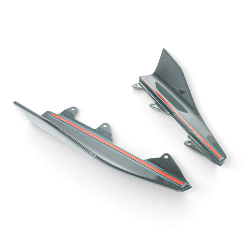 Carbon Corp. BMW M2 F87 carbon fiber side skirt winglets with high-gloss finish and pre-applied adhesive strips.