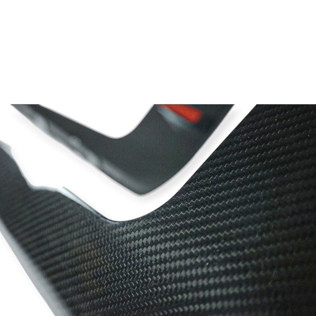 Carbon Corp. carbon fibre M Performance style side skirt winglets for BMW M2 G87 with a high-gloss finish.