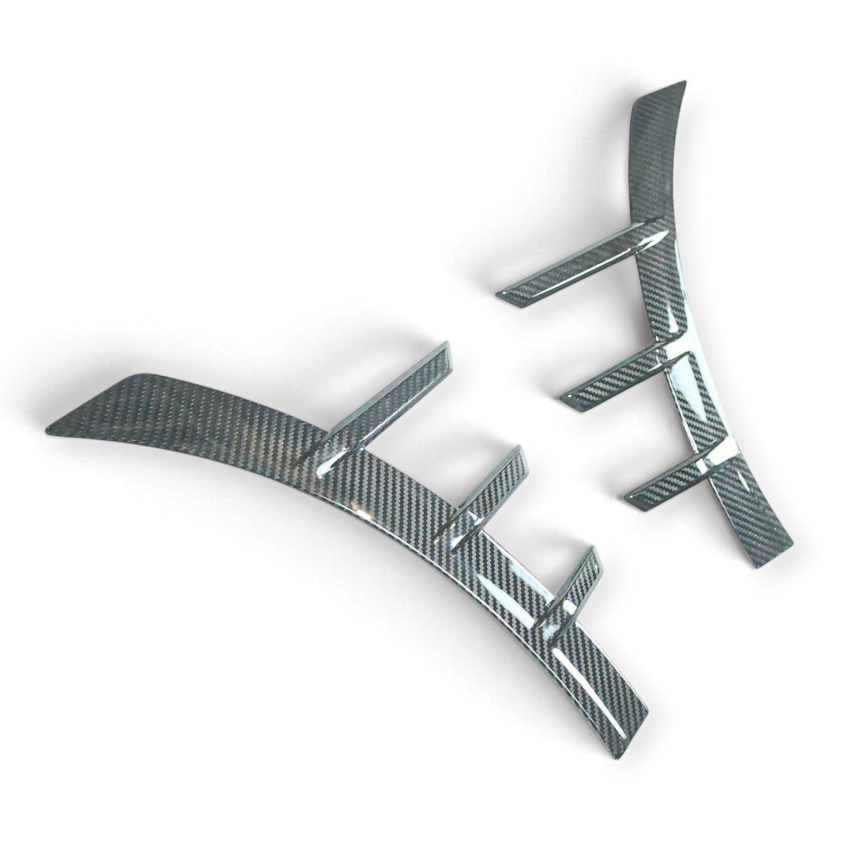 Carbon Corp. BMW M2 G87 carbon fibre front arch trim set with a high-gloss finish for an aggressive motorsport look.