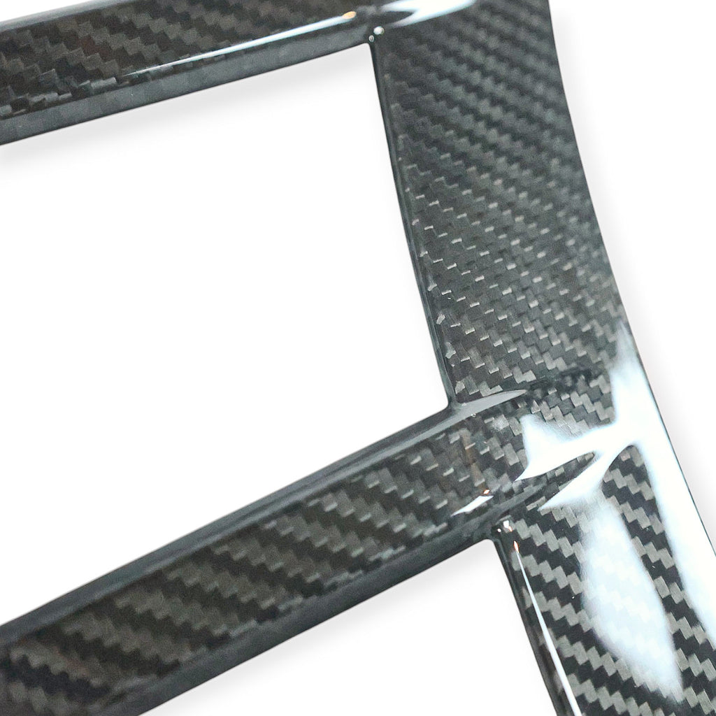 Carbon Corp. glossy carbon fibre front arch trim for BMW M2 G87 featuring a precise motorsport-inspired design