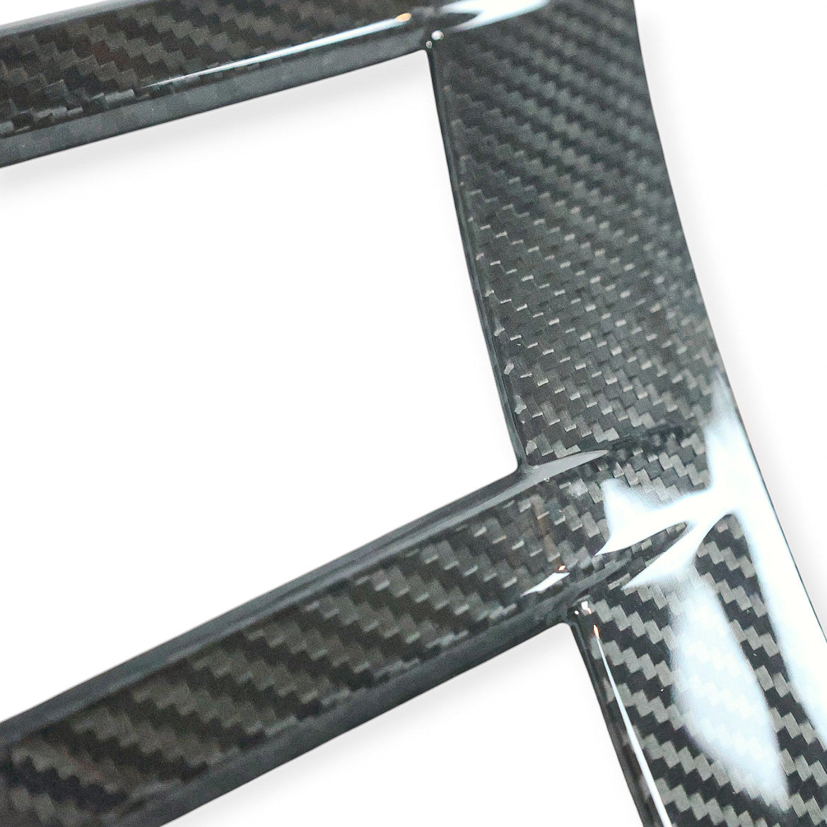 Carbon Corp. glossy carbon fibre front arch trim for BMW M2 G87 featuring a precise motorsport-inspired design