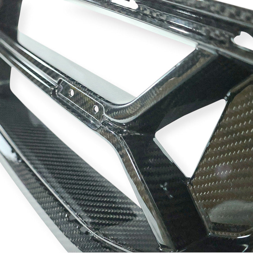 Carbon Corp. BMW M2 G87 CSL style front grille in high-gloss carbon fibre with an open-bar minimalist design.