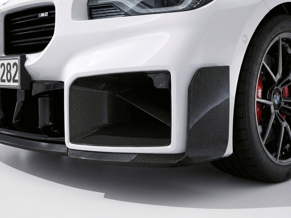 Carbon Corp. gloss carbon fibre front vent duct installed on a white BMW M2 G87 front bumper