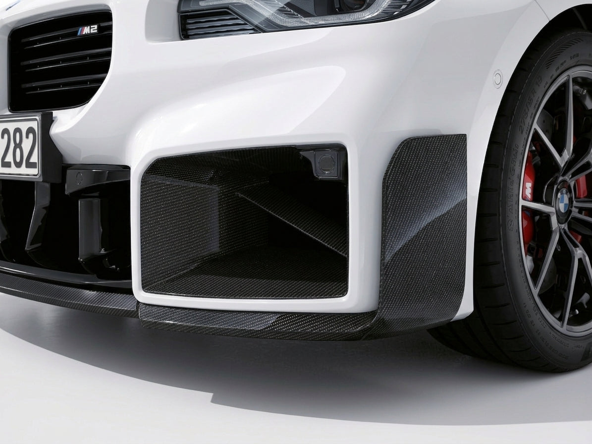 Carbon Corp. gloss carbon fibre front vent duct installed on a white BMW M2 G87 front bumper