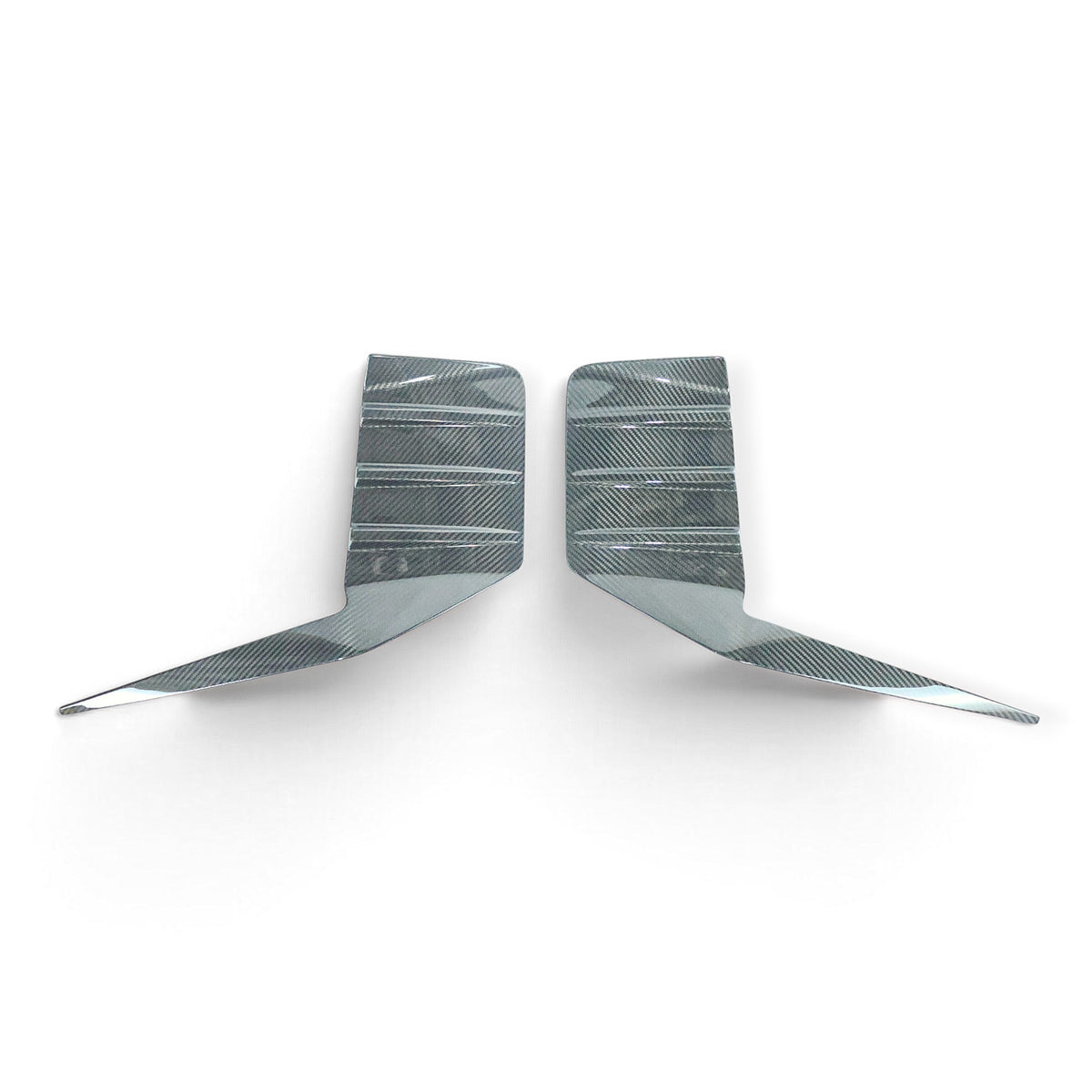 Carbon Corp. BMW M2 G87 carbon fibre rear bumper trim set with a high-gloss finish for a race-inspired look.