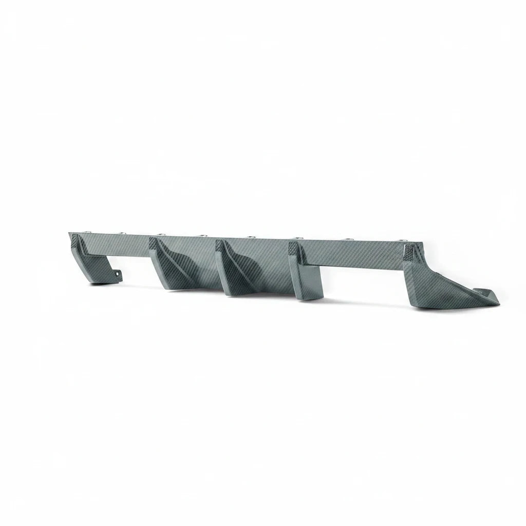 Carbon Corp. BMW M2 G87 carbon fibre rear diffuser with aggressive vertical fins and high-gloss finish