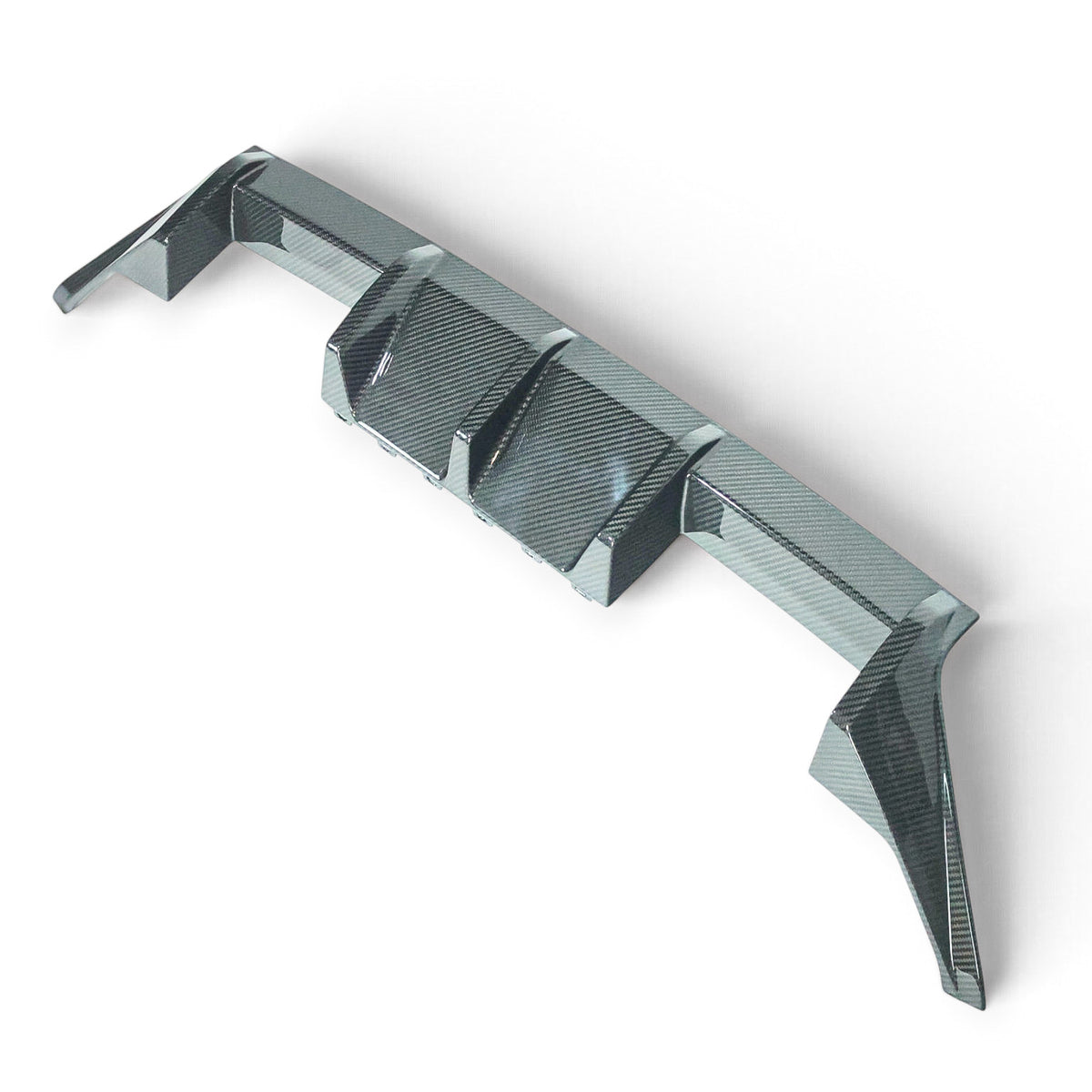 Carbon Corp. BMW M2 G87 carbon fibre rear diffuser with aggressive vertical fins and high-gloss finish.