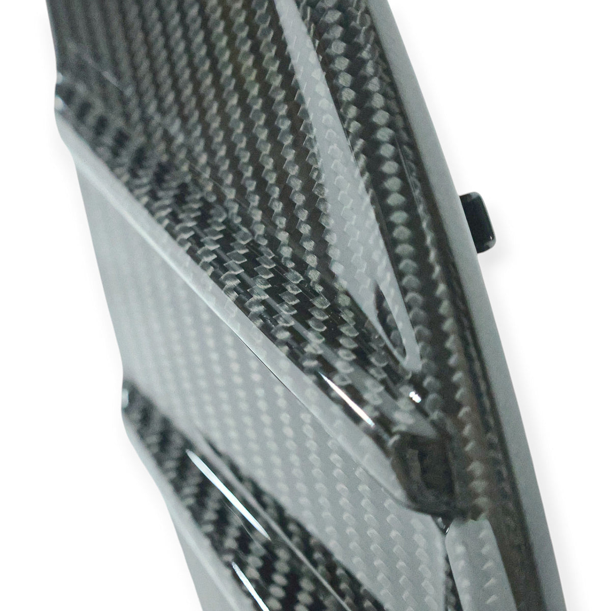 Carbon Corp. high-gloss carbon fibre side fender trim for BMW M3 G80 and M4 G82 with a detailed weave pattern.