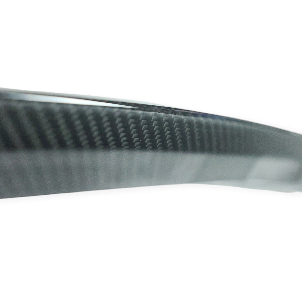 Carbon Corp. glossy carbon fibre MP style rear lip spoiler for BMW G20 and G80, showing detailed weave texture.
