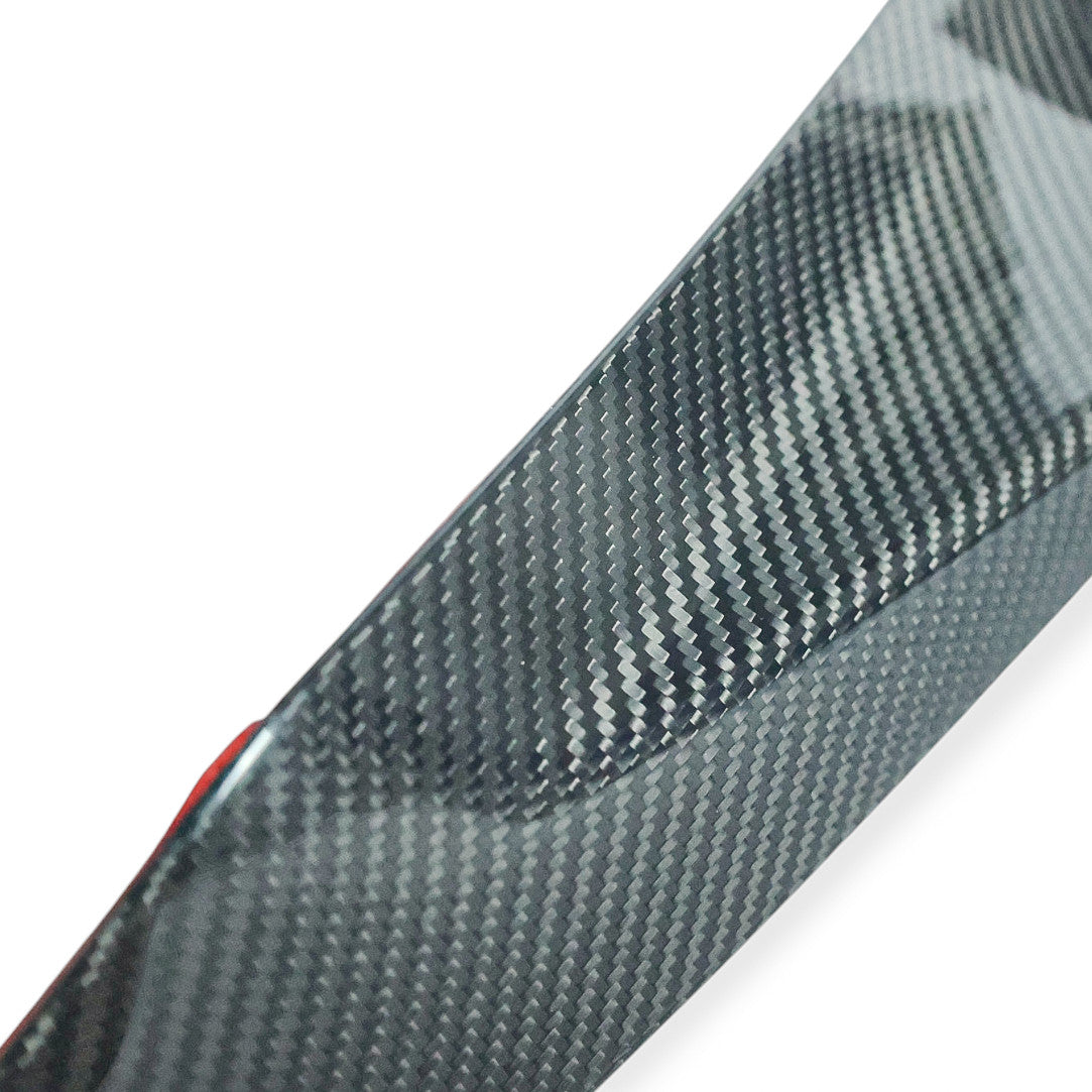 Carbon Corp. CSL style carbon fibre front splitter for BMW G80 G82 with a glossy UV-resistant weave finish