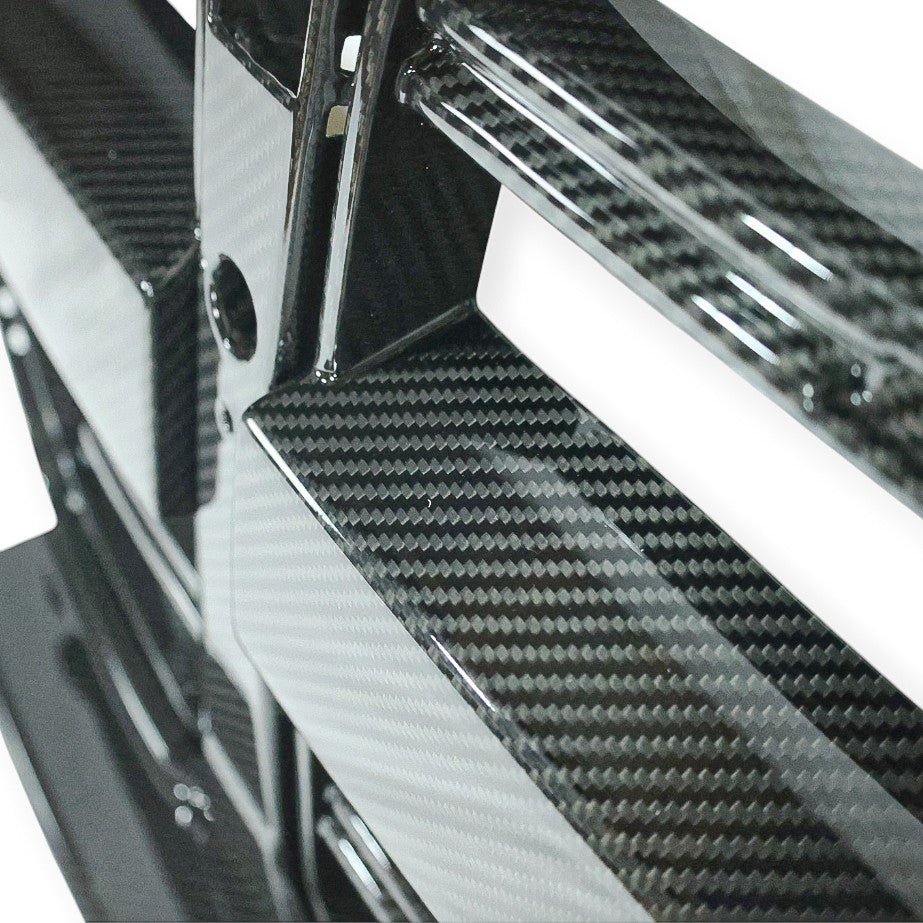 Carbon Corp. CSL style carbon fibre front grille for BMW M3 G80 and M4 G82 with a glossy weave finish.
