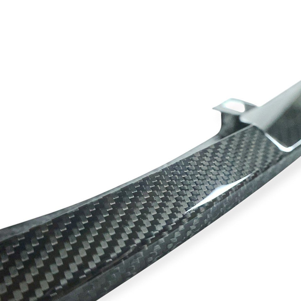 Carbon Corp. CSL style carbon fibre front splitter for BMW M3 and M4 with a high-gloss UV-resistant finish.