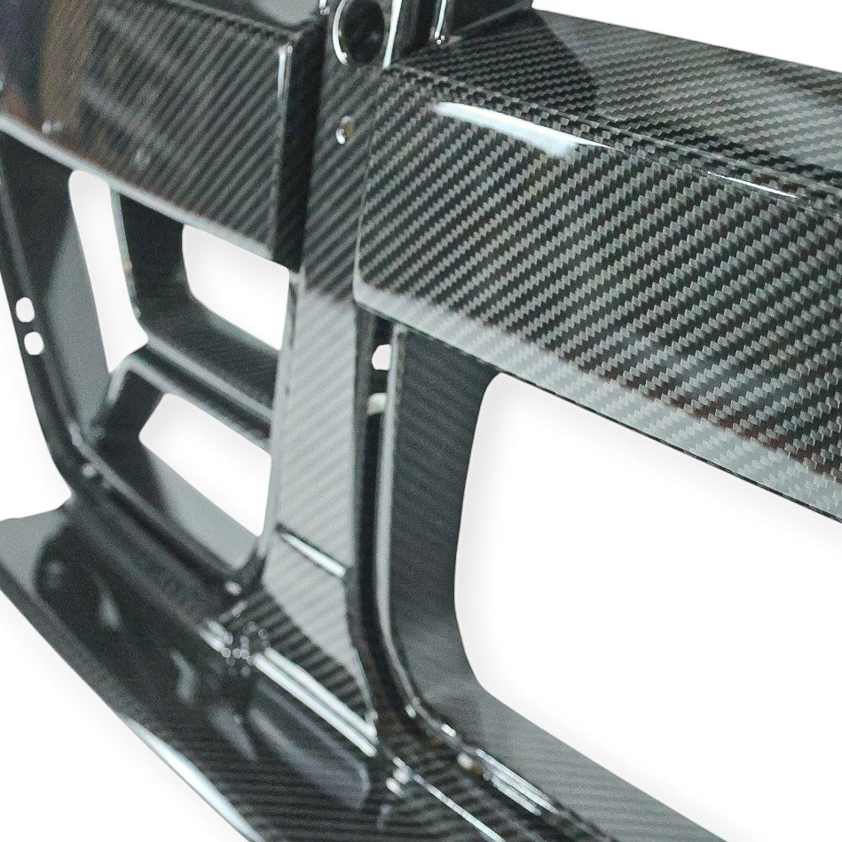Carbon Corp. CSL style carbon fibre front grille for BMW M3 G80 and M4 G82 with integrated ACC radar sensor mount.