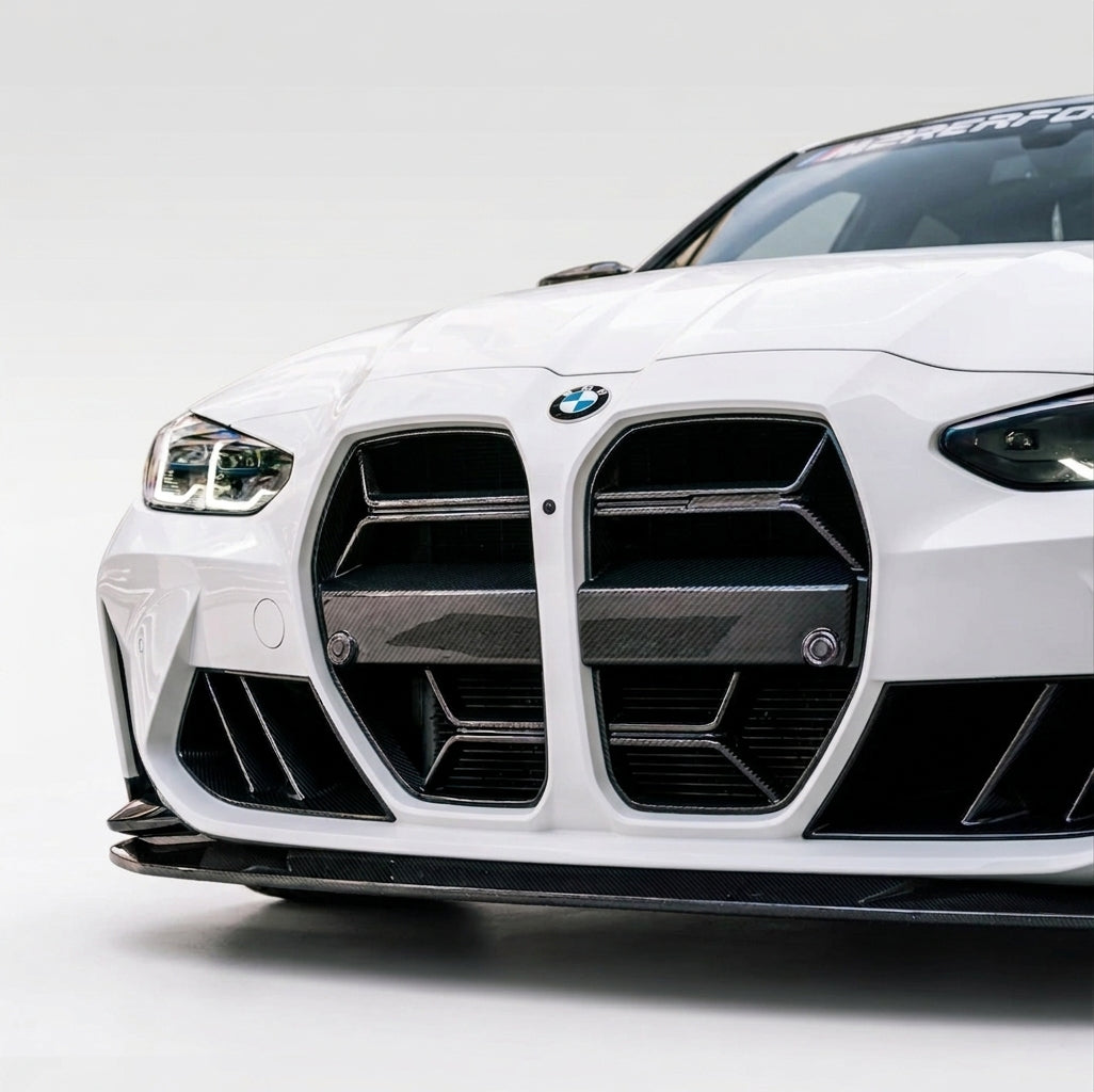 Carbon Corp. CSL style carbon fibre front grille installed on a white BMW M3 G80, featuring an open-slat design.