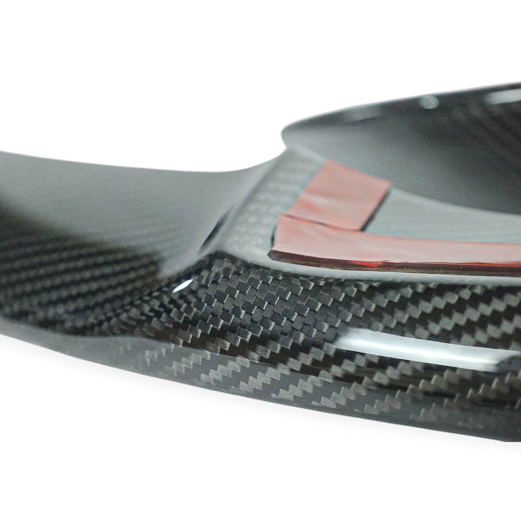 Carbon Corp. dry carbon fiber front splitter for BMW M3 F80 and M4 F82 with high-gloss finish and adhesive backing