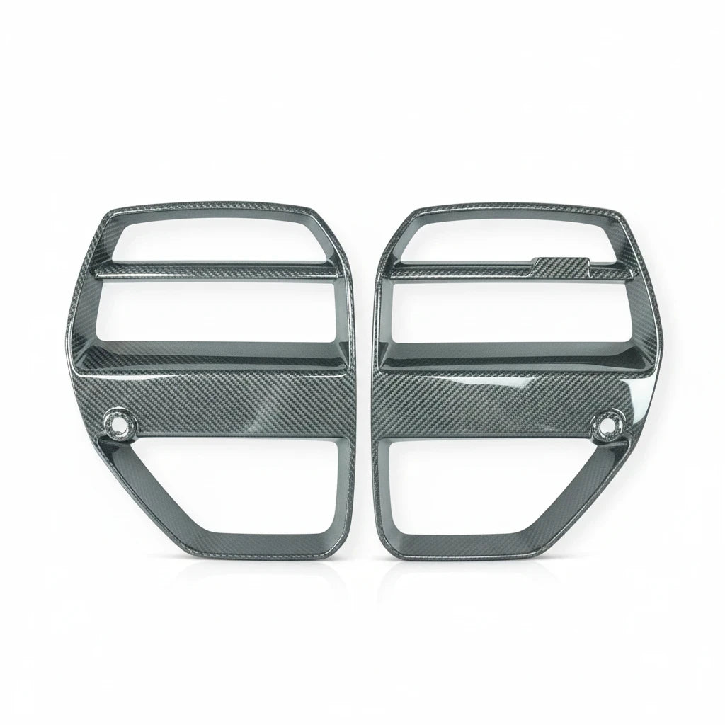 Carbon Corp. V Style carbon fibre front grille for BMW M3 G80 and M4 G82 with integrated ACC radar module cutouts.