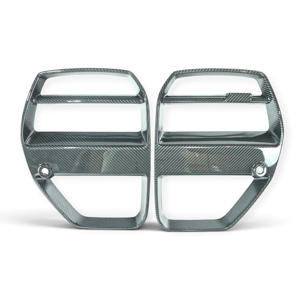 Carbon Corp. V Style carbon fibre front grille for BMW M3 G80 and M4 G82 with integrated ACC radar module cutout.