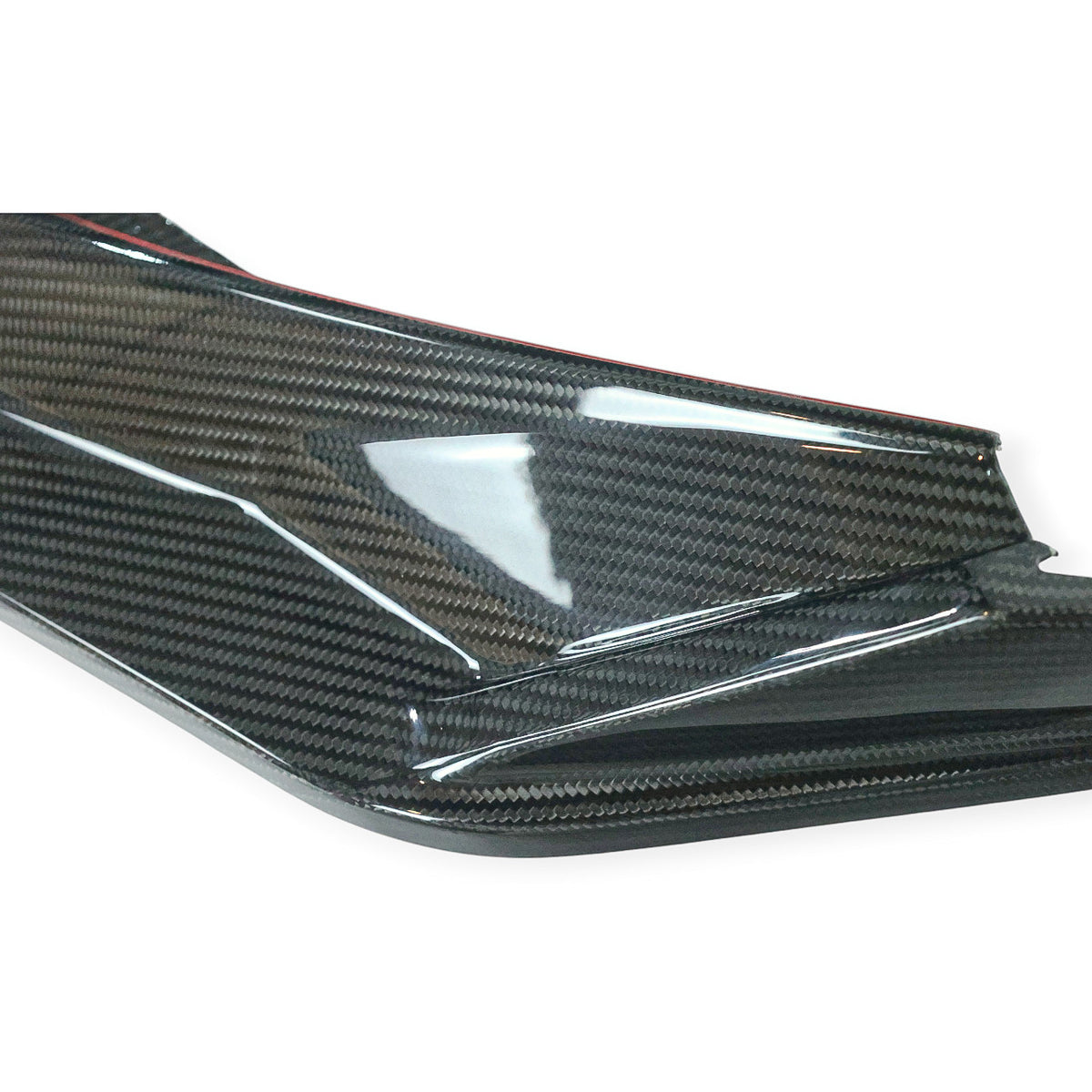 Carbon Corp. V-style carbon fibre front splitter for BMW G80 and G82 with a high-gloss UV-resistant finish.
